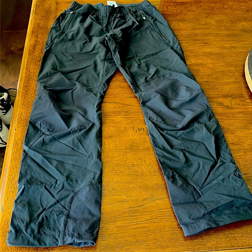 ADIDAS TEREX black size small hiking pants  2 zip pockets. Adjustable legs.